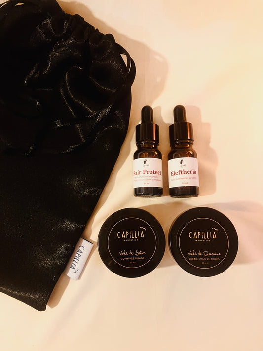 Pochette Signature Sérum visage 10ml + Sérum cheveux 10ml + gommage visage 30ml + creme corps 30ml